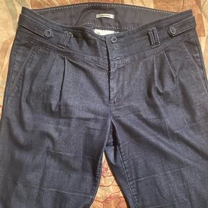 Wide legged jeans with front pockets and pleats